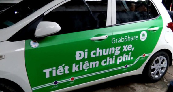 Đầu tư - Nghi vấn việc Grab chấp nhận lỗ hàng trăm tỷ để chiếm thị phần taxi?