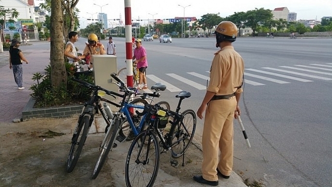 Theo dự thảo mới, người đi xe đạp sẽ bị phạt nếu mắc những lỗi này- Ảnh 1.