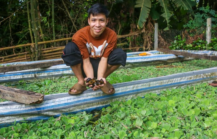 Anh nông dân thu lãi nửa tỷ/năm nhờ nuôi con "hiền lành mắn đẻ", thích ăn xơ mít- Ảnh 1.