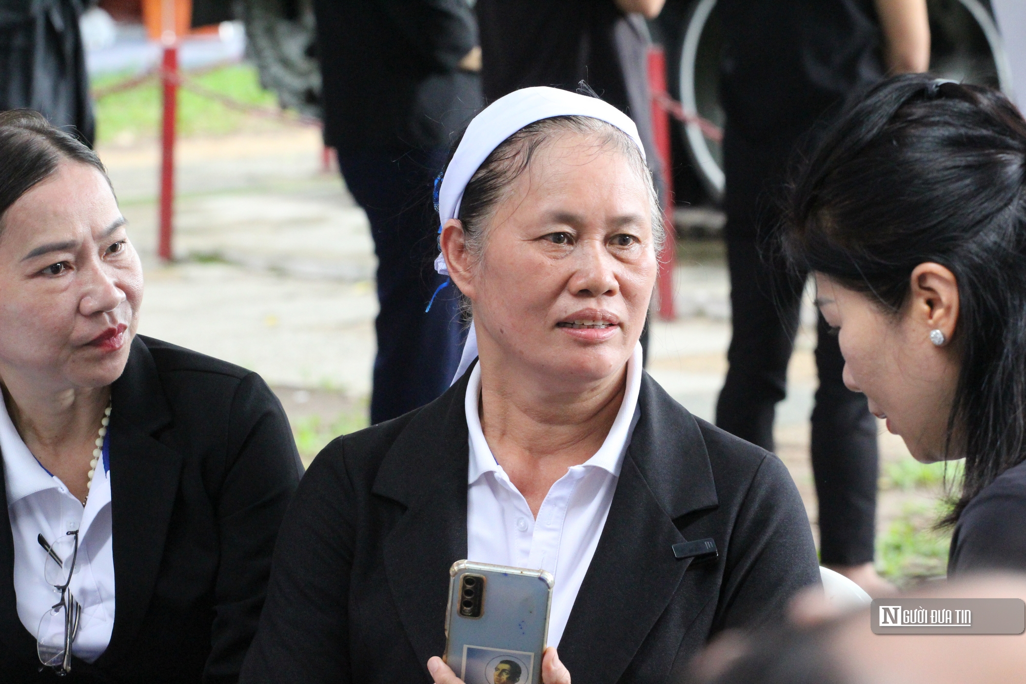 Tp.Hồ Chí Minh: Người dân trang nghiêm theo dõi lễ truy điệu Tổng Bí thư Nguyễn Phú Trọng- Ảnh 14.