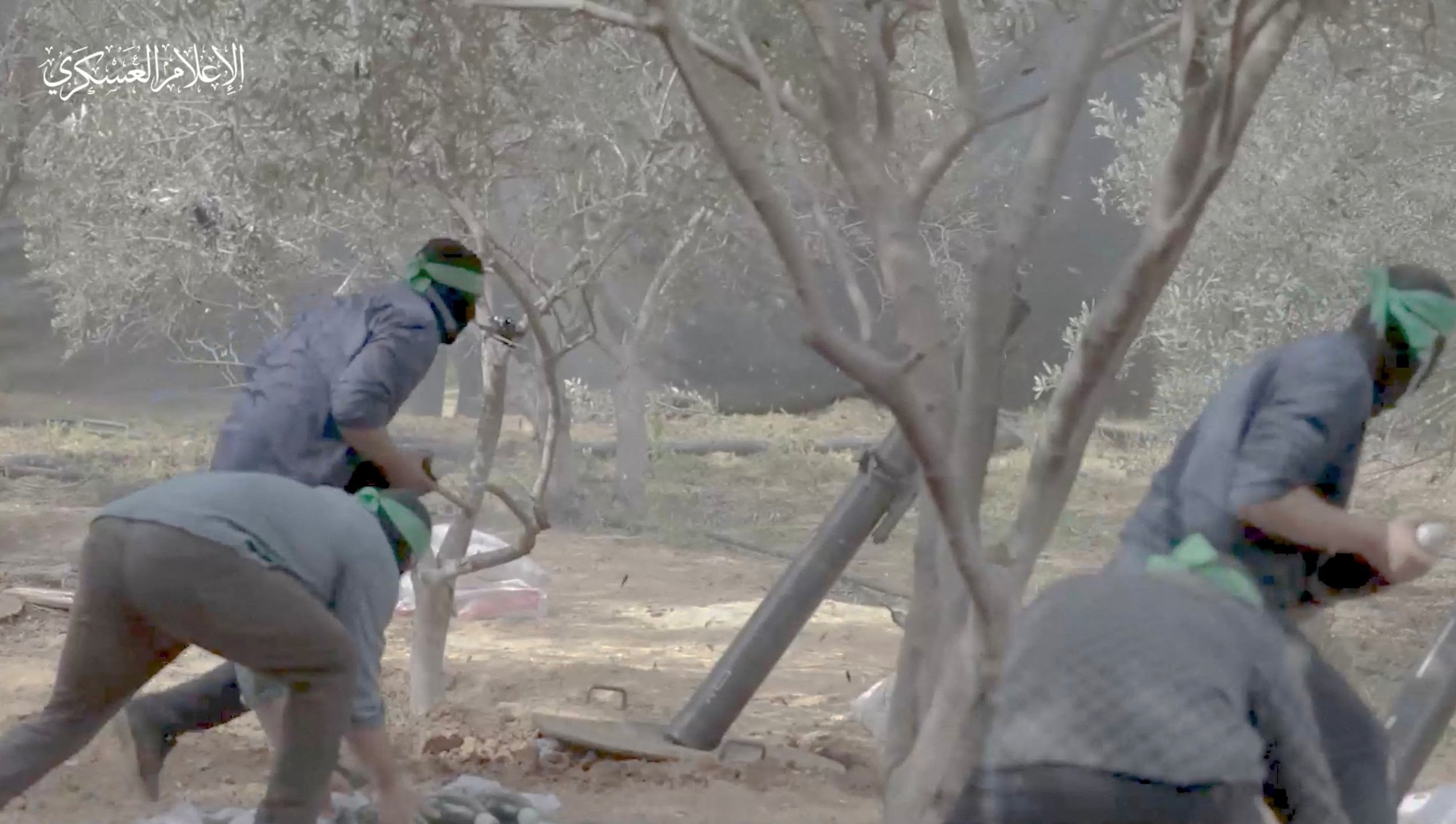 Hamas releases footages showing what it says are its fighters firing mortar shells at Israeli forces