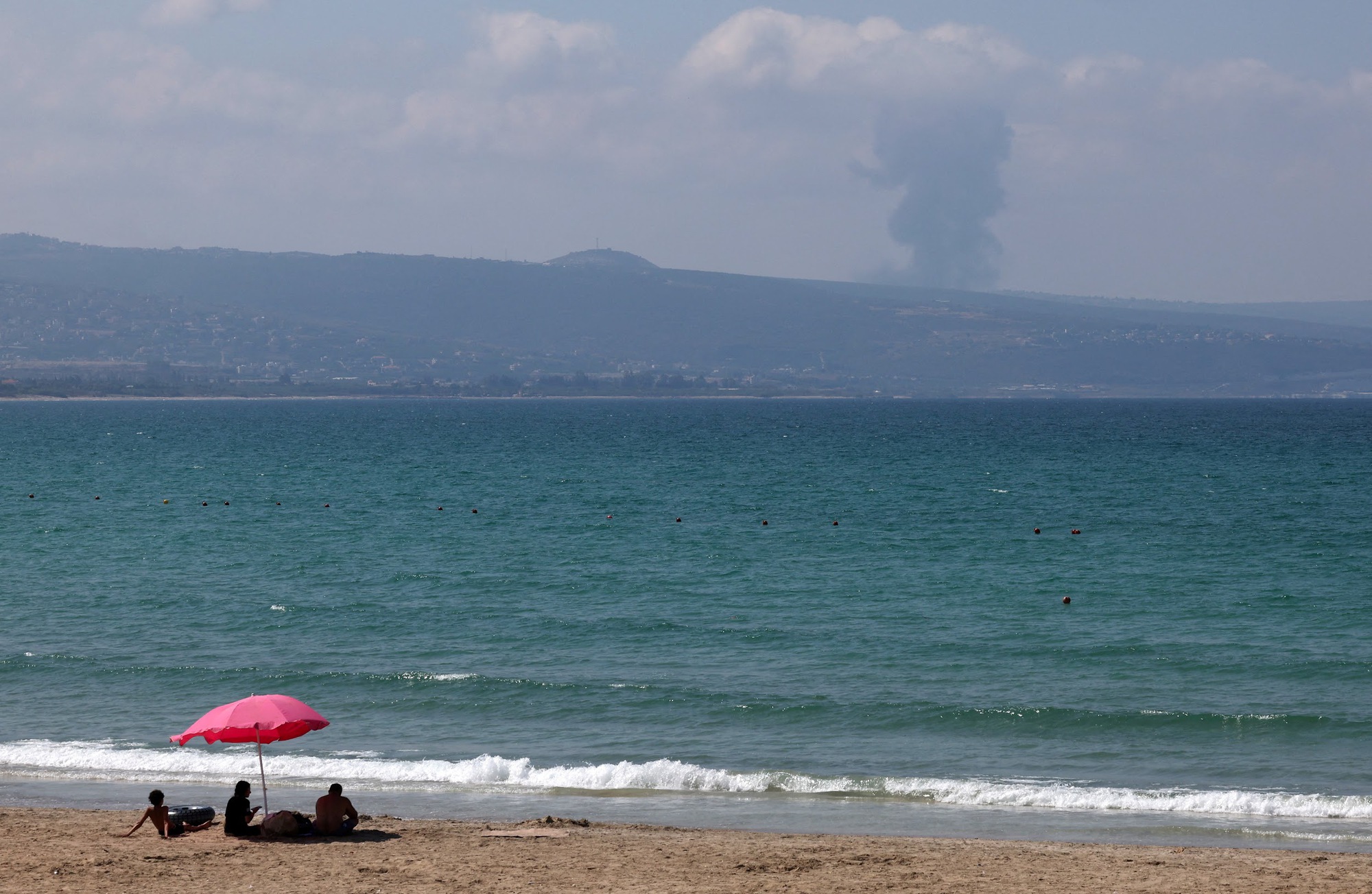 A view shows smoke on the Lebanese side of the border with Israel, as seen from Tyre