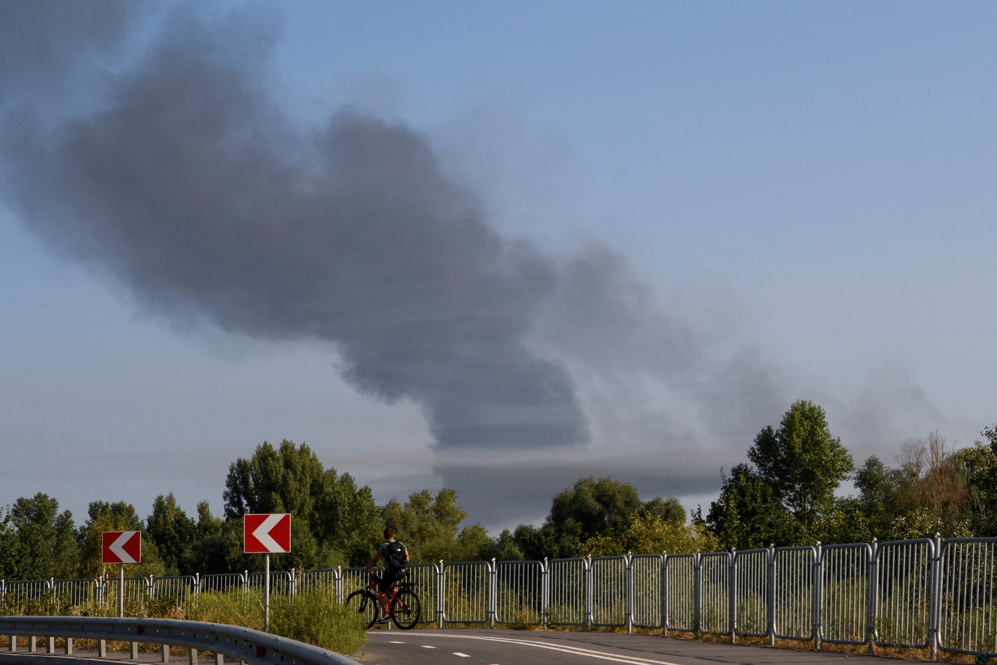 Smoke rises during a Russian missile and drone attack on outskirts of Kyiv