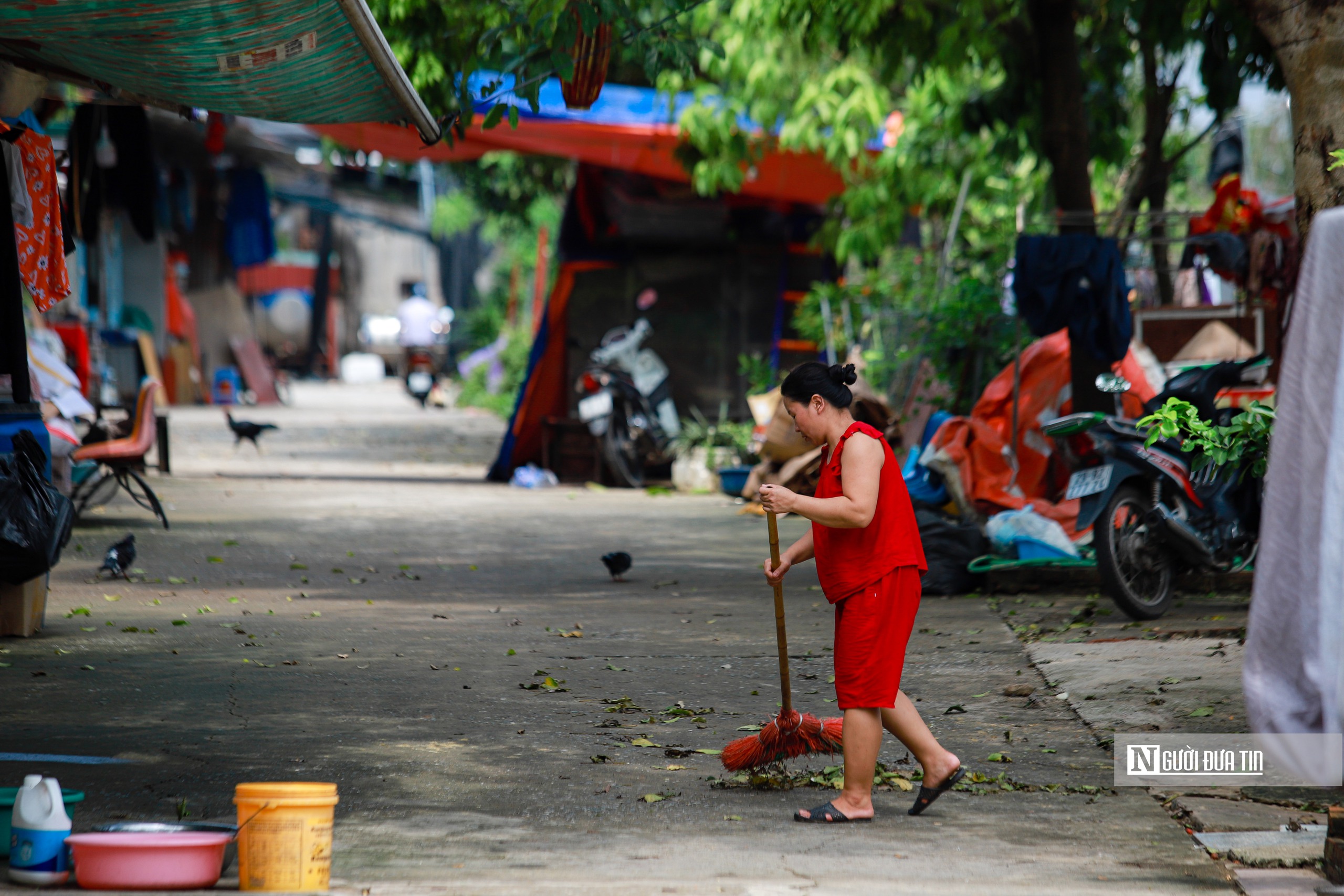 Hà Nội: Người dân tất bật dọn dẹp sau khi nước sông Hồng rút- Ảnh 7.