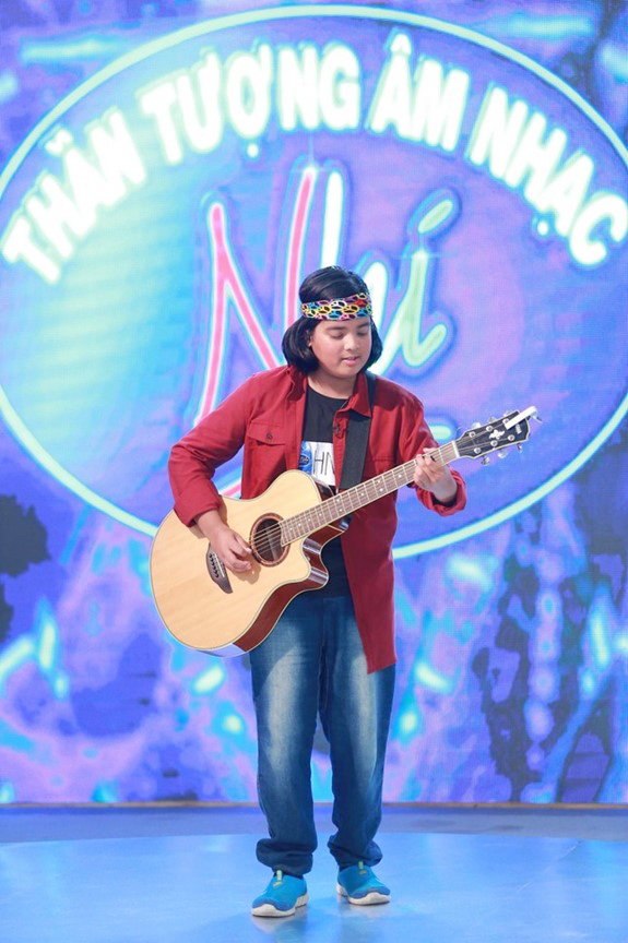 "Thần đồng âm nhạc" Vietnam Idol Kids 2016, biết chơi 16 loại nhạc cụ, là bác sĩ đa khoa tương lai- Ảnh 1.