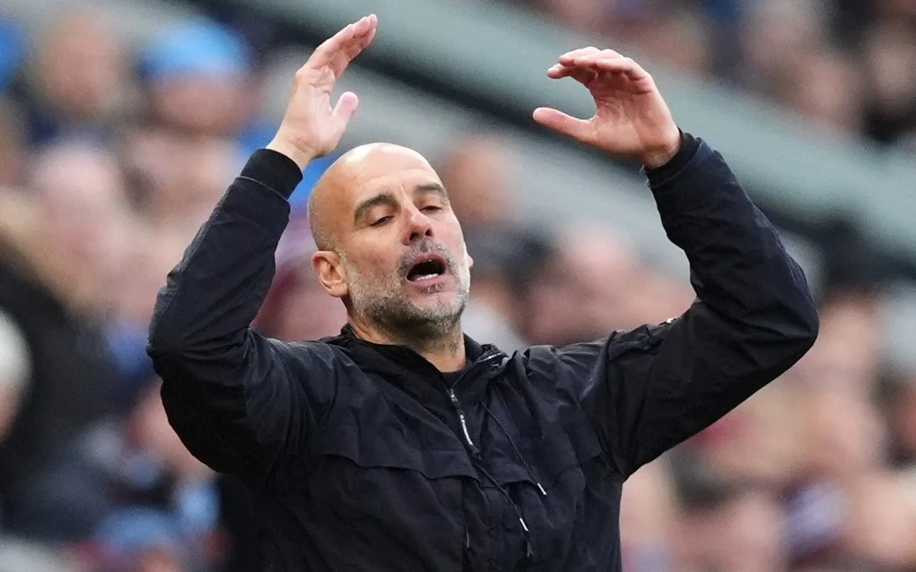 Phản ứng của HLV Pep Guardiola trước khoảng cách 6 điểm với Arsenal - Ảnh 1.