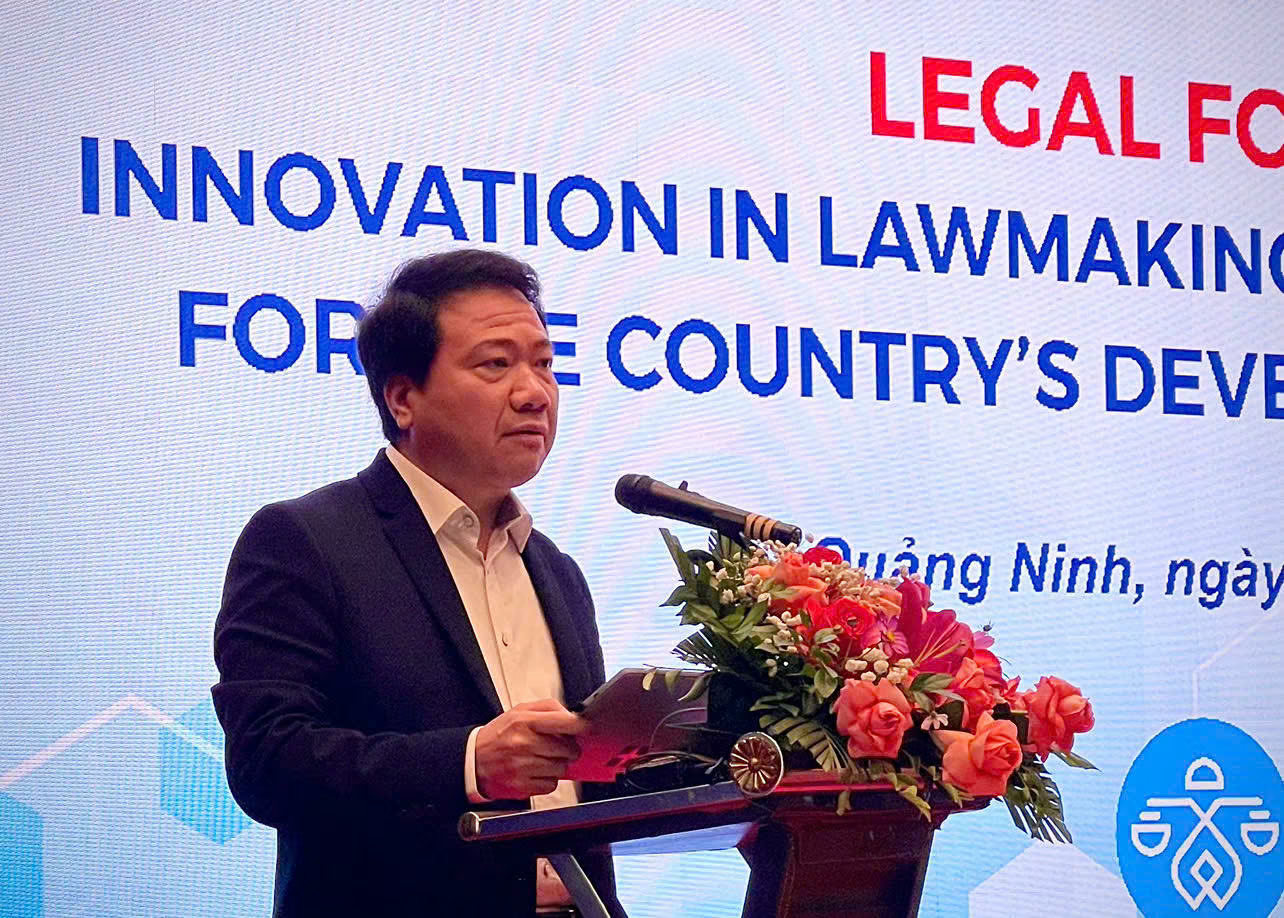 Bộ trưởng Bộ Tư Pháp Nguyễn Hải Ninh: "Đưa thể chế, pháp luật thực sự trở thành lợi thế cạnh tranh quốc gia"- Ảnh 5.