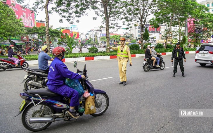 Mức phạt lỗi xe máy đi sai làn đường theo quy định mới nhất, ai cũng nên biết- Ảnh 1.