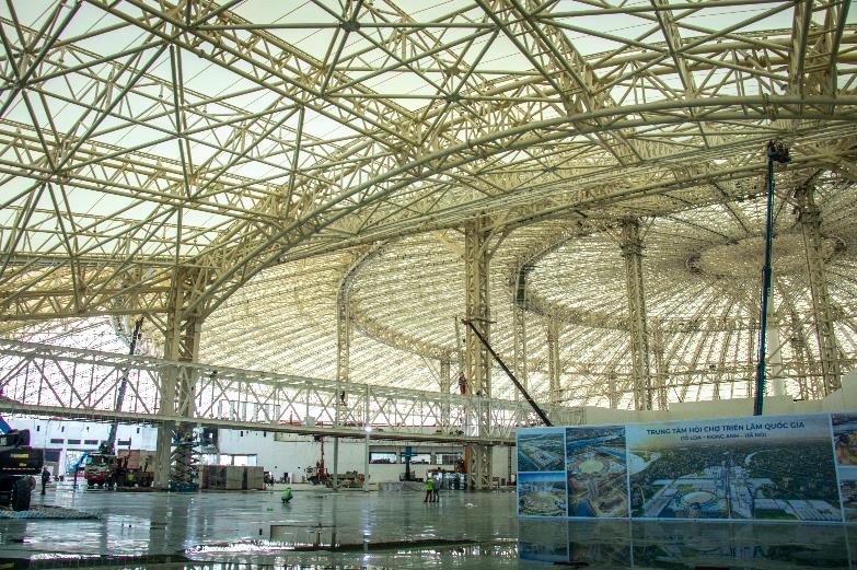 Phá kỷ lục tiến độ, Trung tâm Triển lãm Quốc gia - biểu tượng phát triển mới của Thủ đô lộ diện- Ảnh 3. Phá kỷ lục tiến độ, Trung tâm Triển lãm Quốc gia - biểu tượng phát triển mới của Thủ đô lộ diện- Ảnh 3.