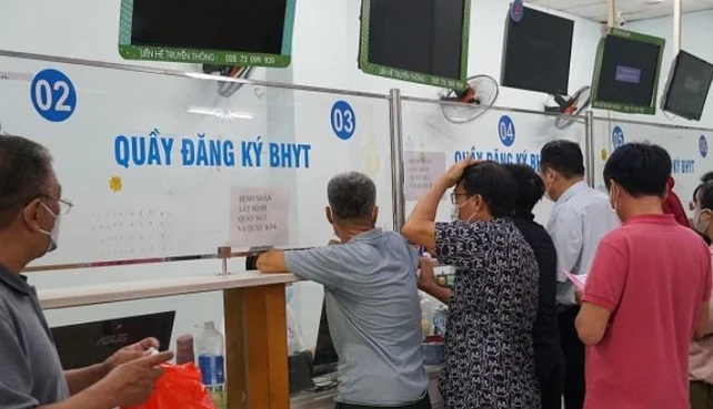 Mức đóng, mức hỗ trợ và trách nhiệm đóng bảo hiểm y tế mới đối với người lao động- Ảnh 1.