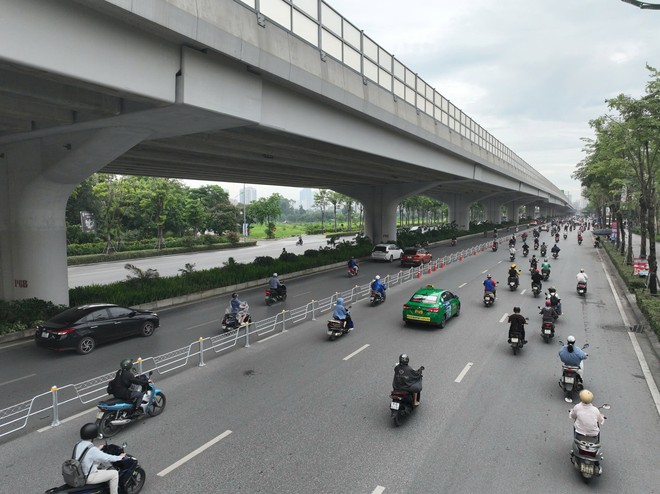 Hà Nội: Từ 4/7 sẽ thực hiện phân làn trên đường Phạm Văn Đồng- Ảnh 1.