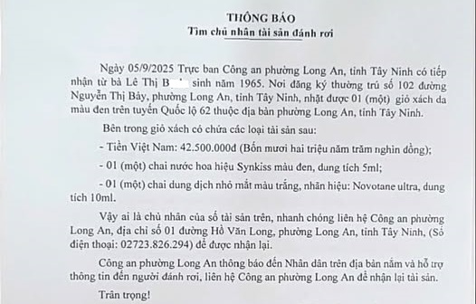Tìm người đánh rơi túi xách tiền trên quốc lộ - Ảnh 1.