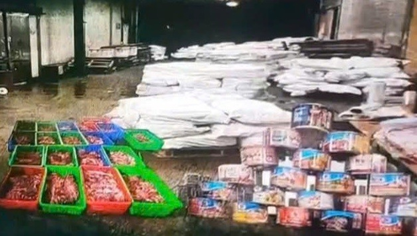 Khởi tố 9 bị can trong vụ tiêu thụ 130 tấn thịt lợn nhiễm dịch - Ảnh 1.