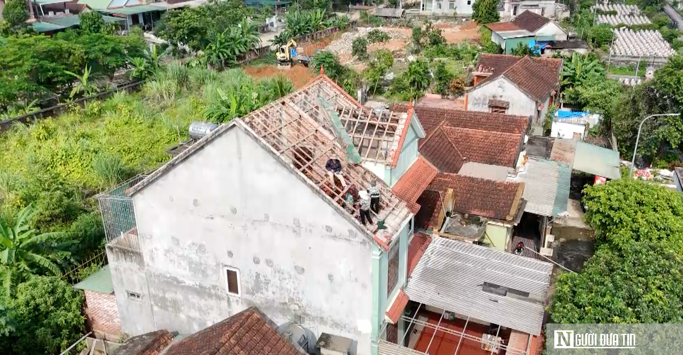 Ấm lòng người dân tự nguyện dỡ nhà kiên cố, nhường đất mở rộng Nghĩa trang liệt sĩ Quốc tế Việt - Lào - Ảnh 2.