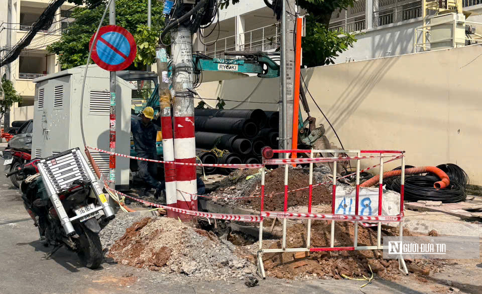Tp.HCM: “Điểm đen” hàng chục trụ điện trên đường Chu Văn An được di dời - Ảnh 4.