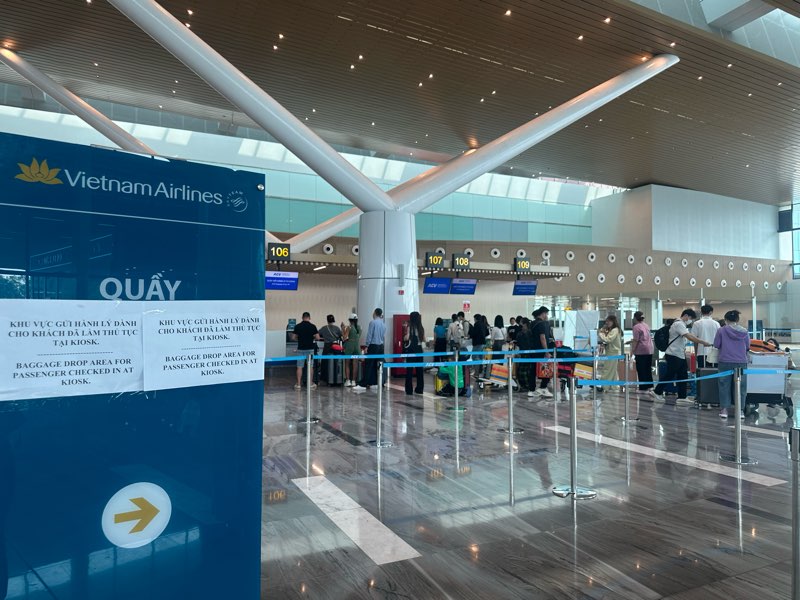 T&acirc;n Sơn Nhất đ&oacute;n lượng kh&aacute;ch kỷ lục ng&agrave;y 26 th&aacute;ng Chạp, hơn 1.000 chuyến bay cất, hạ c&aacute;nh- Ảnh 3.