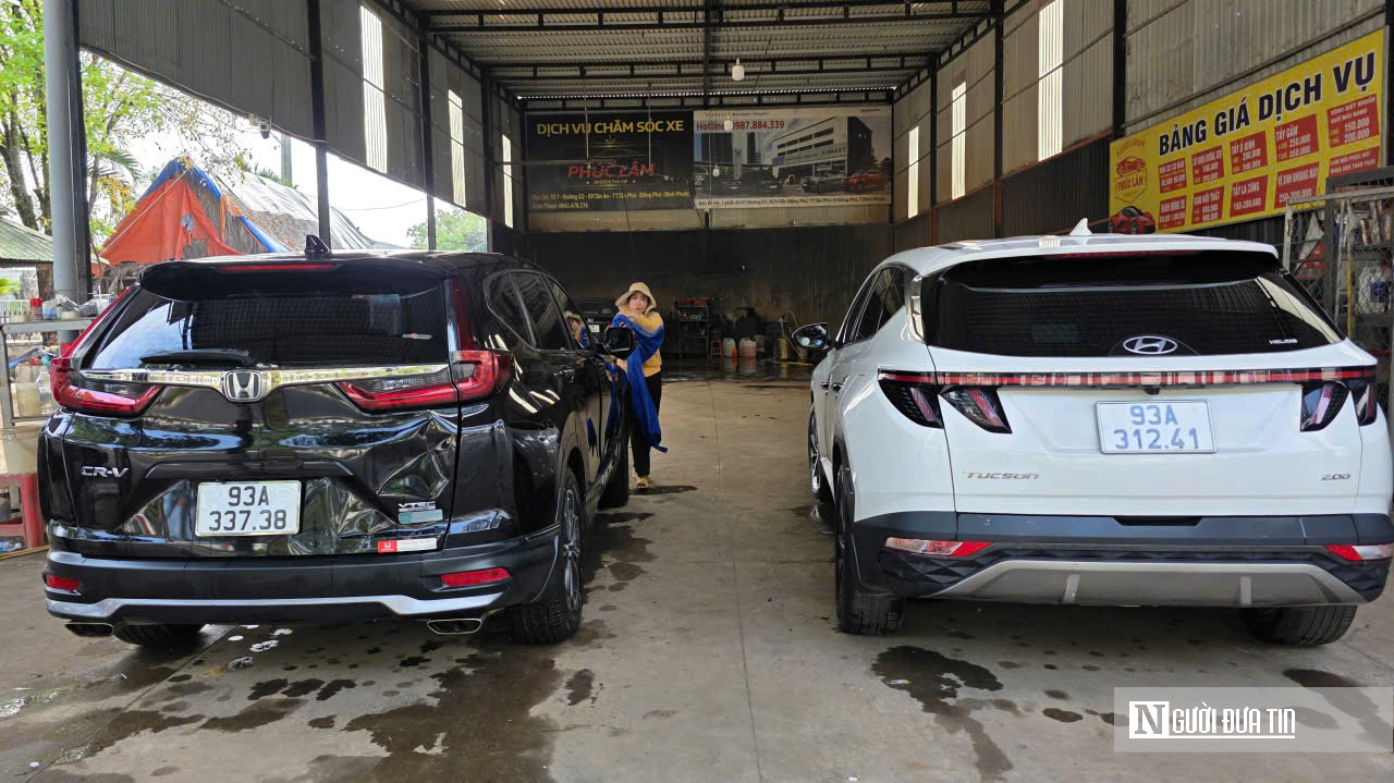 Dịch vụ rửa xe cận Tết tại Đồng Nai: Nhộn nhịp ngay từ sáng sớm- Ảnh 1.