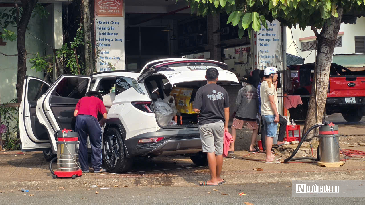 Dịch vụ rửa xe cận Tết tại Đồng Nai: Nhộn nhịp ngay từ sáng sớm- Ảnh 3.
