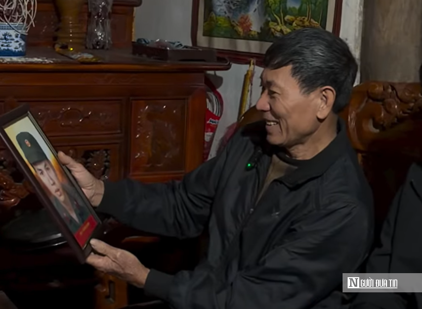 Trao di ảnh liệt sĩ, tiếp nối gi&aacute; trị cao đẹp của lịch sử d&acirc;n tộc- Ảnh 2.