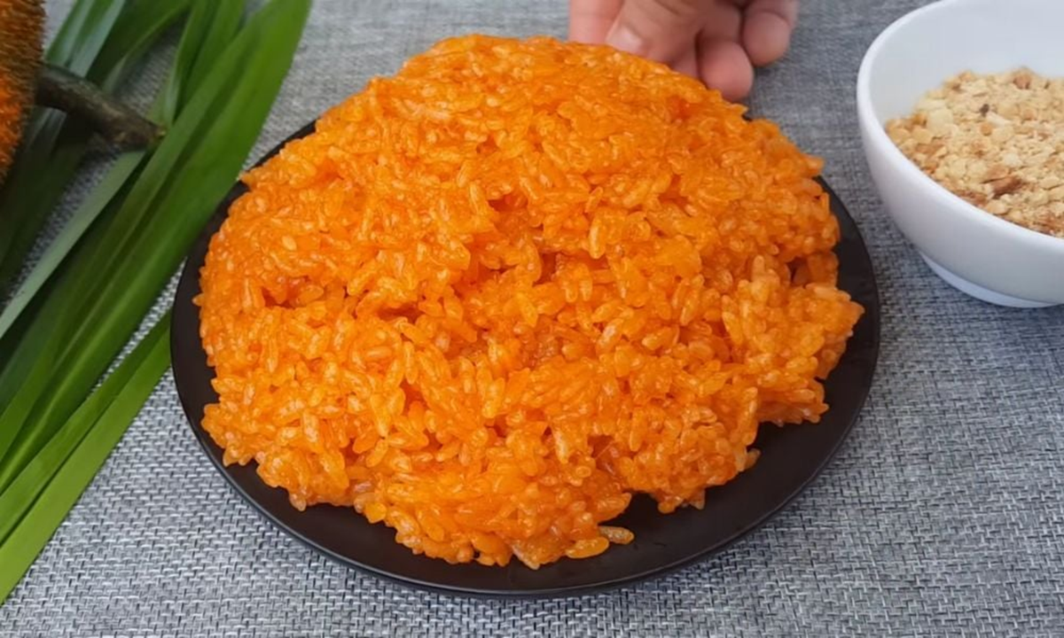 Mách bạn cách nấu xôi gấc cúng Tết để năm mới "đỏ như son" - Ảnh 3.