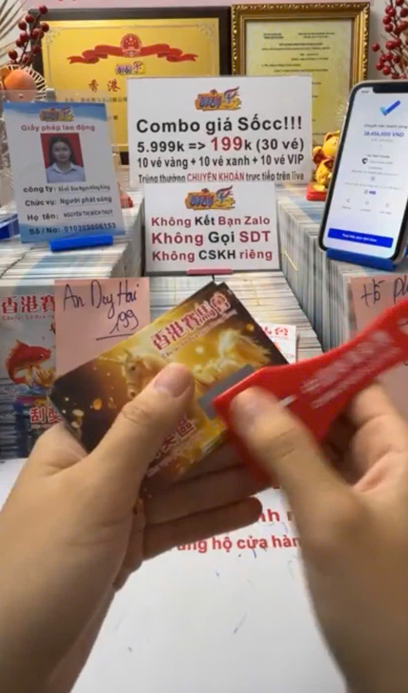 Từ vụ việc ở Nghệ An: Cảnh giác bẫy “cào vé số online”- Ảnh 2. Từ vụ việc ở Nghệ An: Cảnh giác bẫy “cào vé số online”- Ảnh 2.