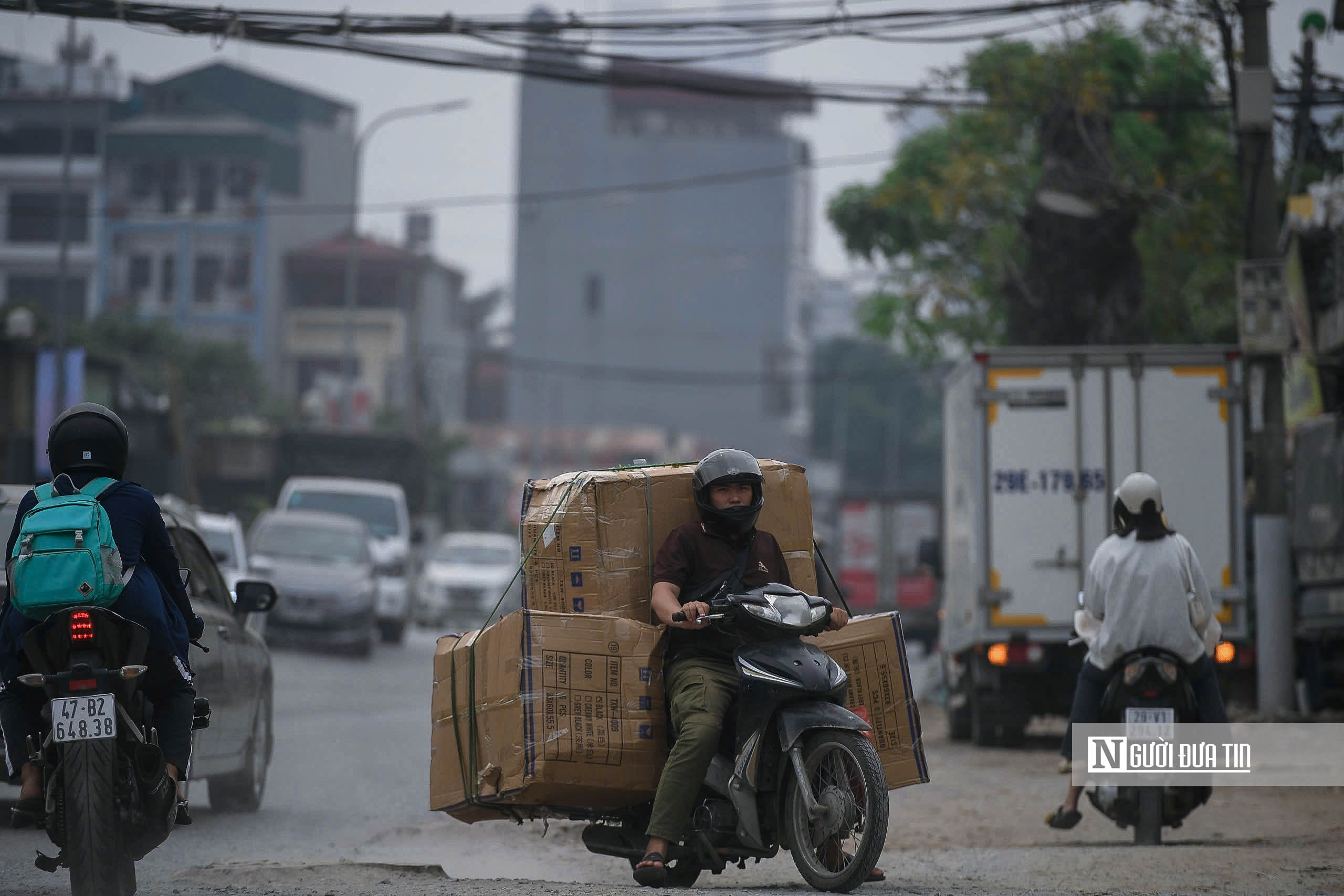 Hà Nội: Người dân ngán ngẩm sống chung với bụi bẩn, ô nhiễm- Ảnh 8.