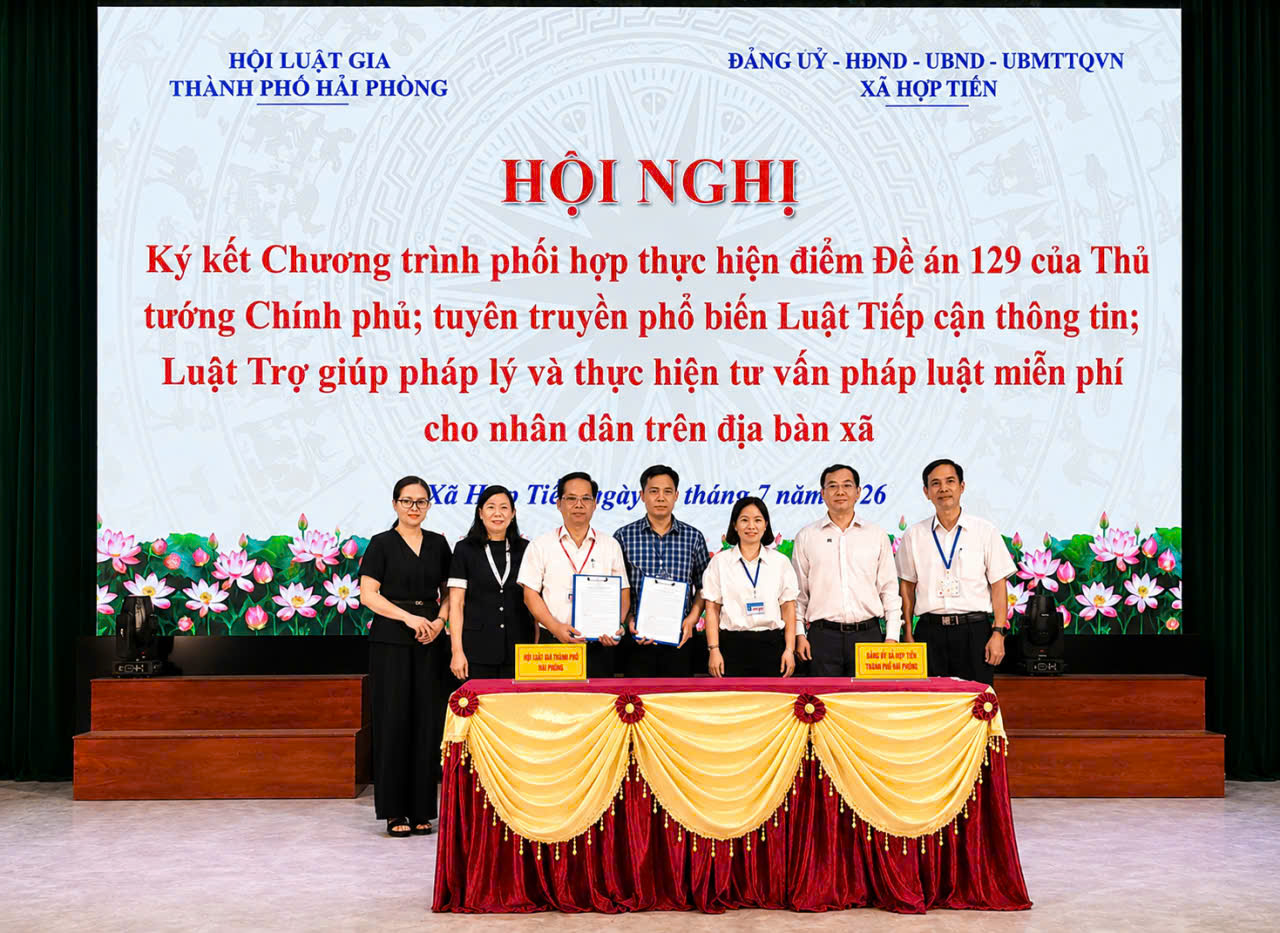 Hải Phòng: Ký kết chương trình phối hợp đưa pháp luật đến gần người dân- Ảnh 1.