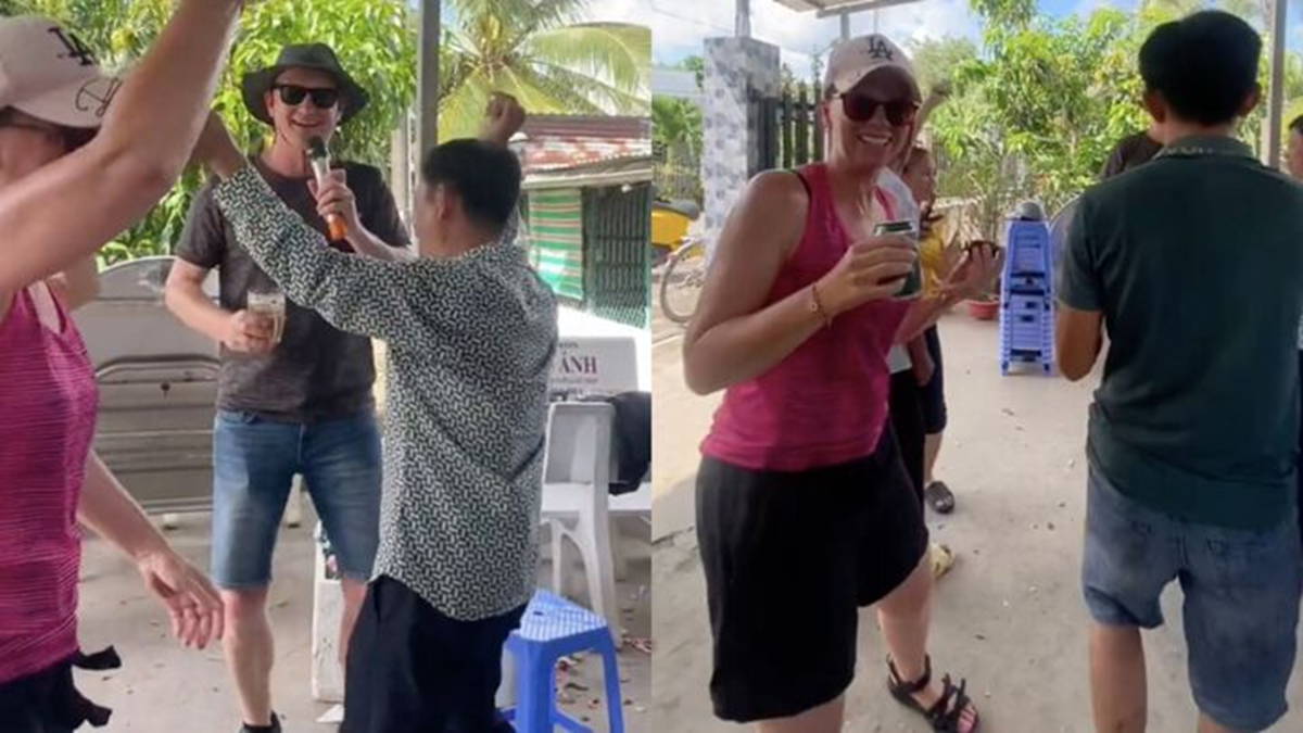Đang đạp xe, khách Tây được mời vào đám giỗ và cái kết bất ngờ - Ảnh 1.