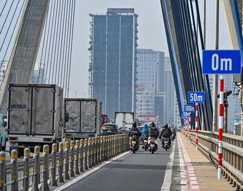 Hà Nội: Giảm tốc độ làn ô tô trên cầu Nhật Tân từ 90 xuống 80 km/h - Ảnh 1.