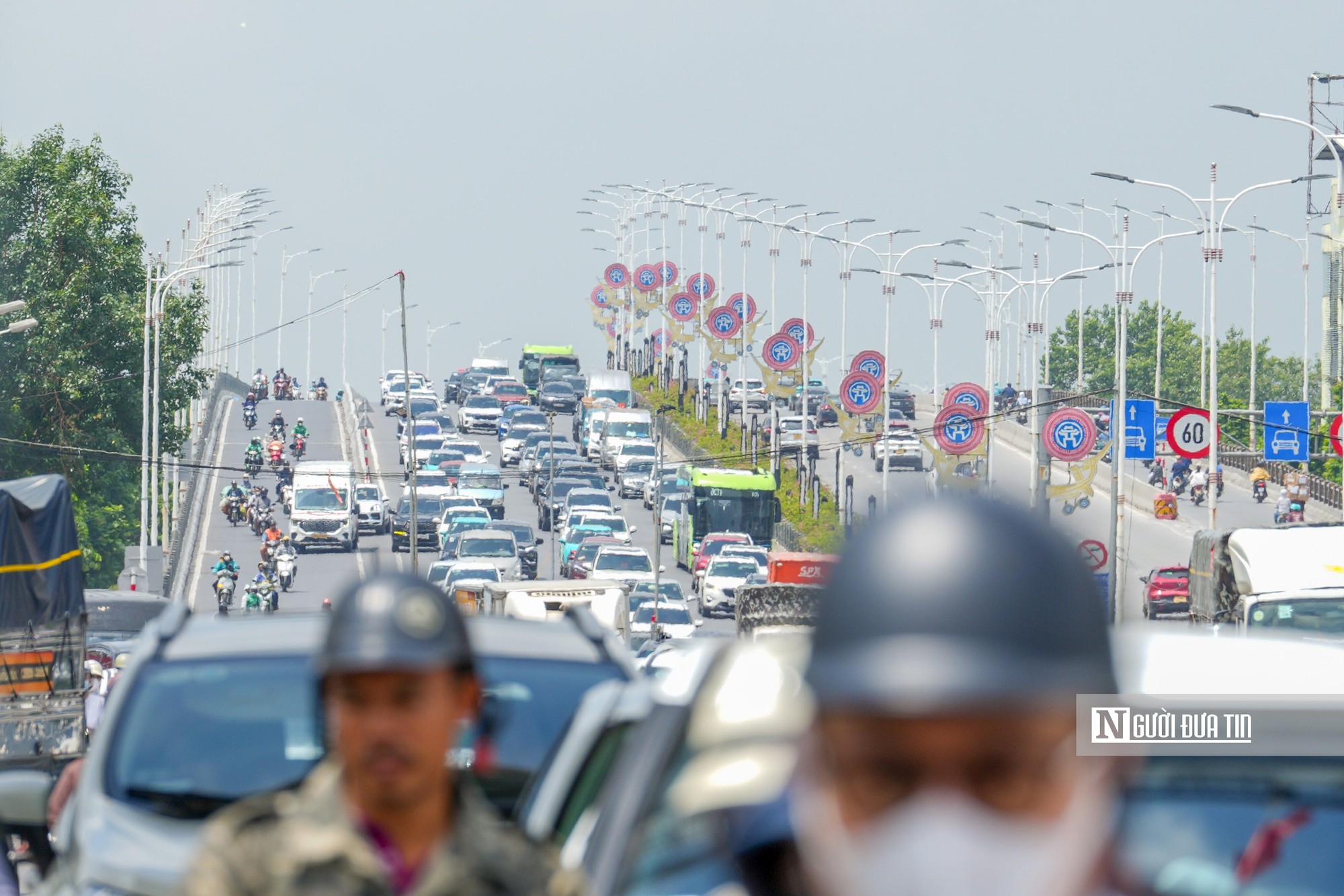 Hà Nội cấm ô tô quay đầu, rẽ trái trên đường Cổ Linh giờ cao điểm- Ảnh 9.