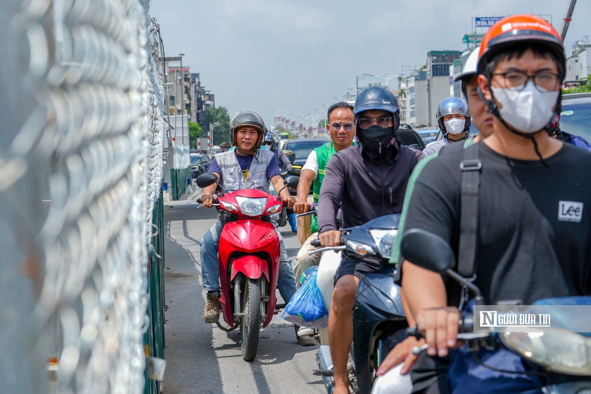 Hà Nội cấm ô tô quay đầu, rẽ trái trên đường Cổ Linh giờ cao điểm- Ảnh 12.