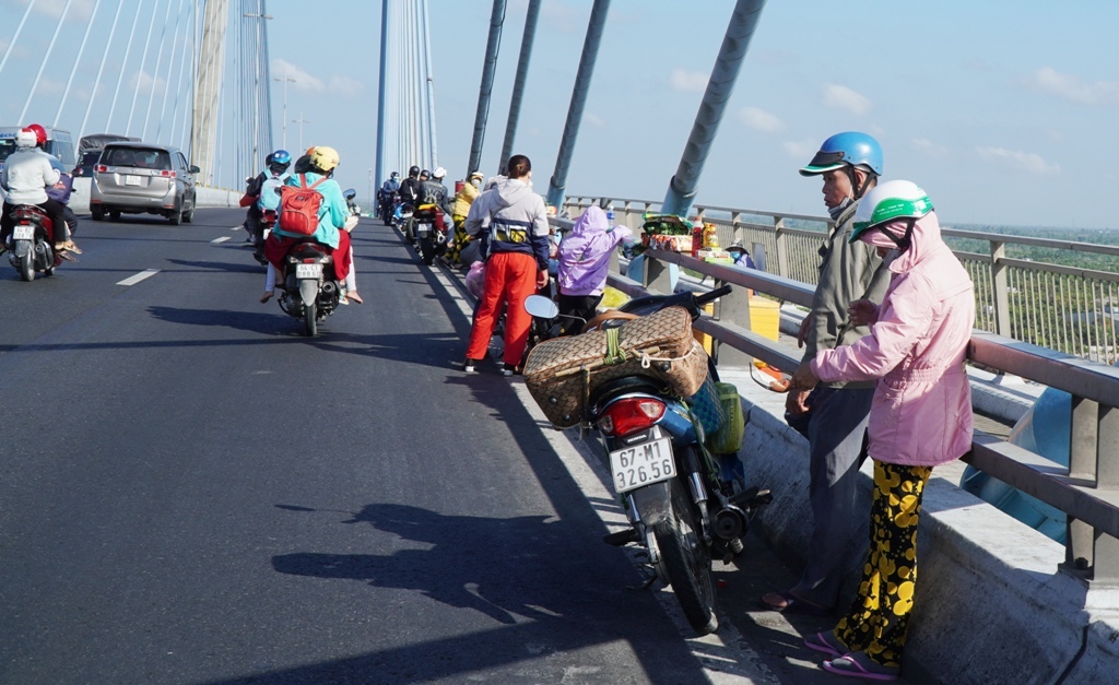 D&acirc;n sinh - Người d&acirc;n c&aacute;c tỉnh Đồng bằng s&ocirc;ng Cửu Long &ugrave;n &ugrave;n rời qu&ecirc; đến Tp.HCM l&agrave;m việc (H&igrave;nh 3).