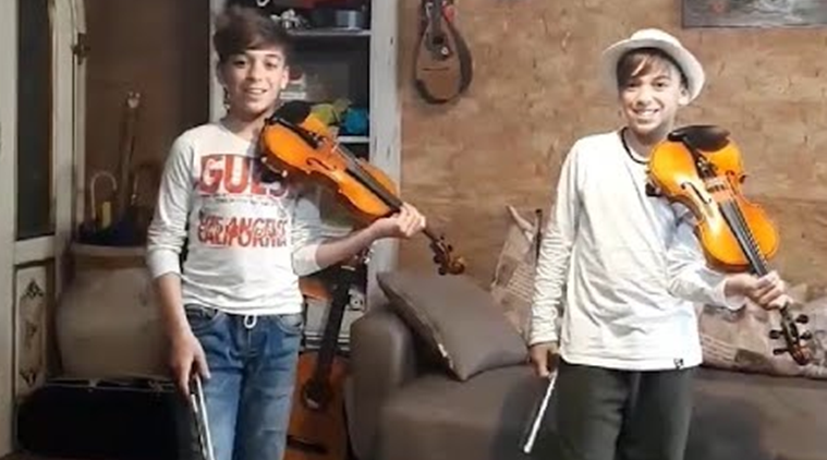 Dân sinh - Cặp song sinh 12 tuổi vui vẻ biểu diễn violin online dù đang bị cách ly tại nhà vì dịch Covid-19 