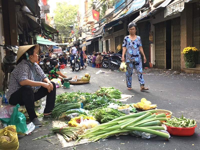 Tin nhanh - TP.HCM: Mới mùng 2 đã hết Tết, người dân bắt đầu cuộc mưu sinh (Hình 16).