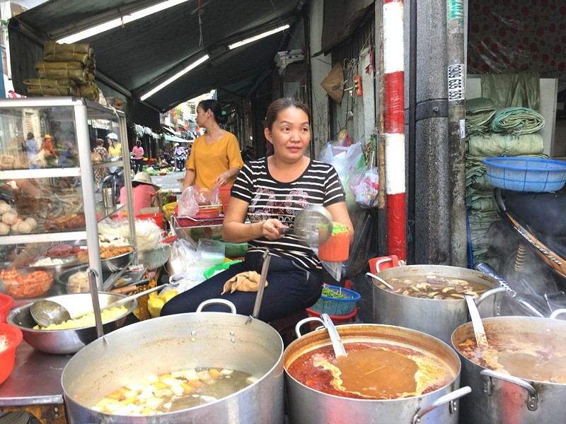 Tin nhanh - TP.HCM: Mới mùng 2 đã hết Tết, người dân bắt đầu cuộc mưu sinh (Hình 15).