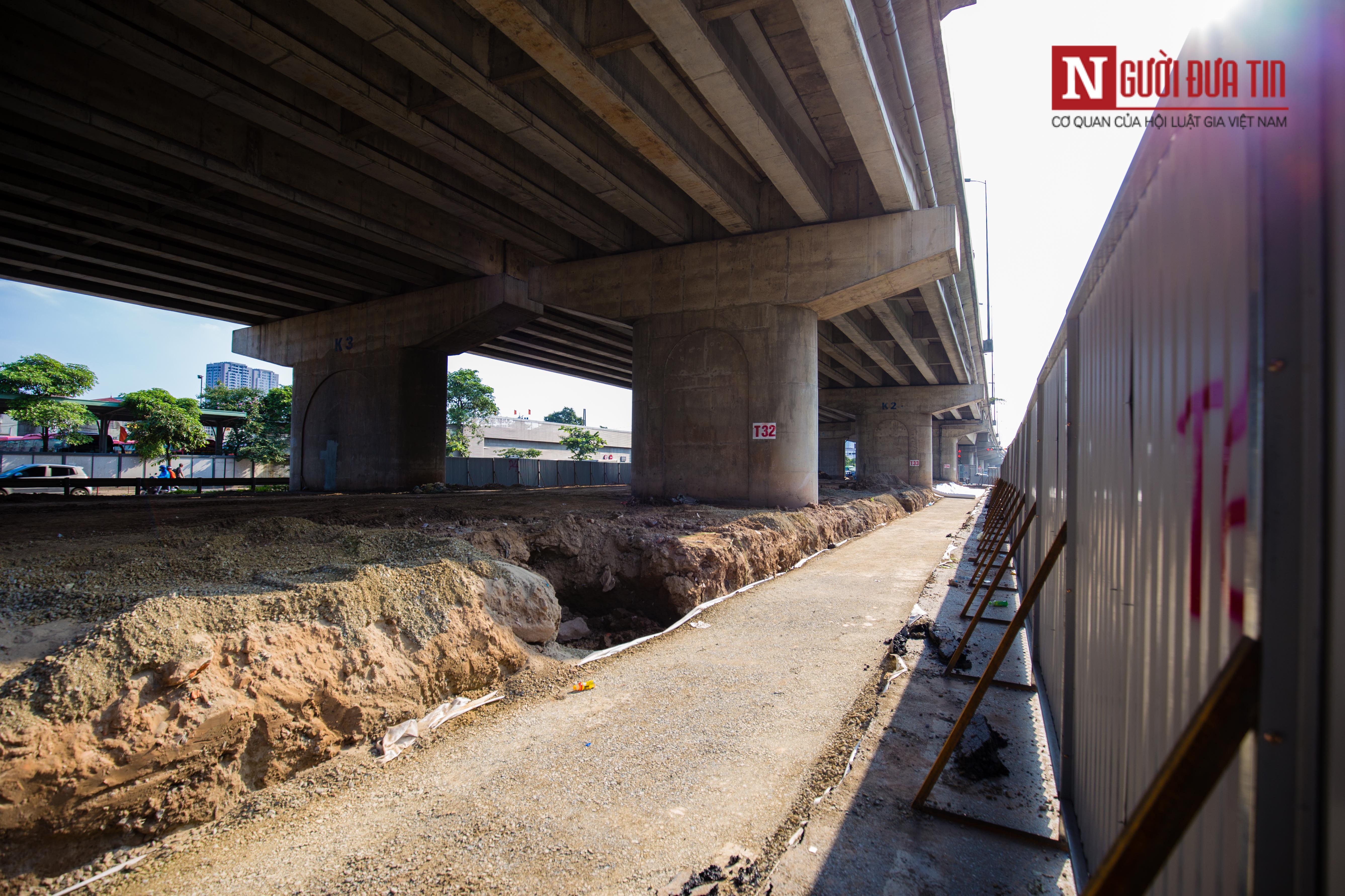 Tin nhanh - Hà Nội: Tiếp tục cắt xén dải phân cách, mở rộng đường đoạn bến xe Nước Ngầm (Hình 9).