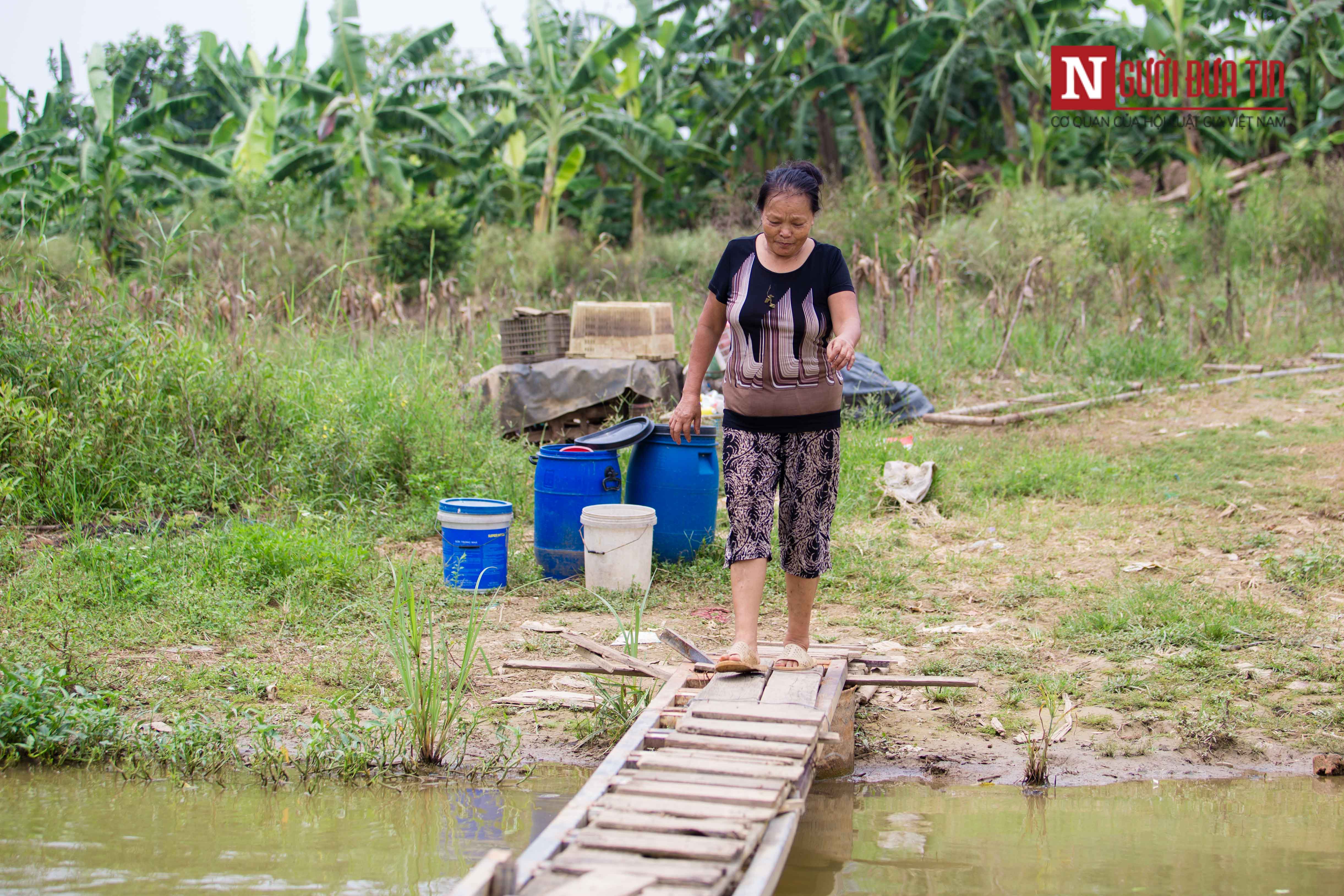 Dân sinh - Chùm ảnh: Cuộc sống 28 hộ dân tại 'ốc đảo' giữa lòng Thủ đô (Hình 7).