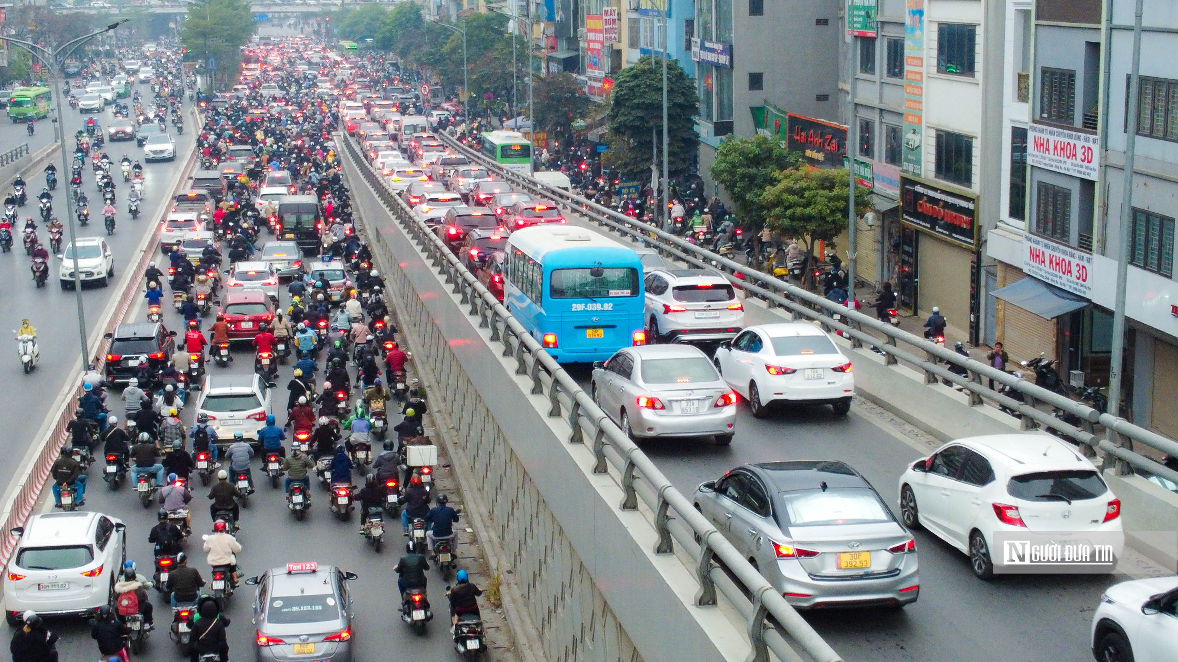 Sự kiện - Hà Nội: Ngã Tư Sở lần thứ tư được phân luồng giao thông (Hình 11).