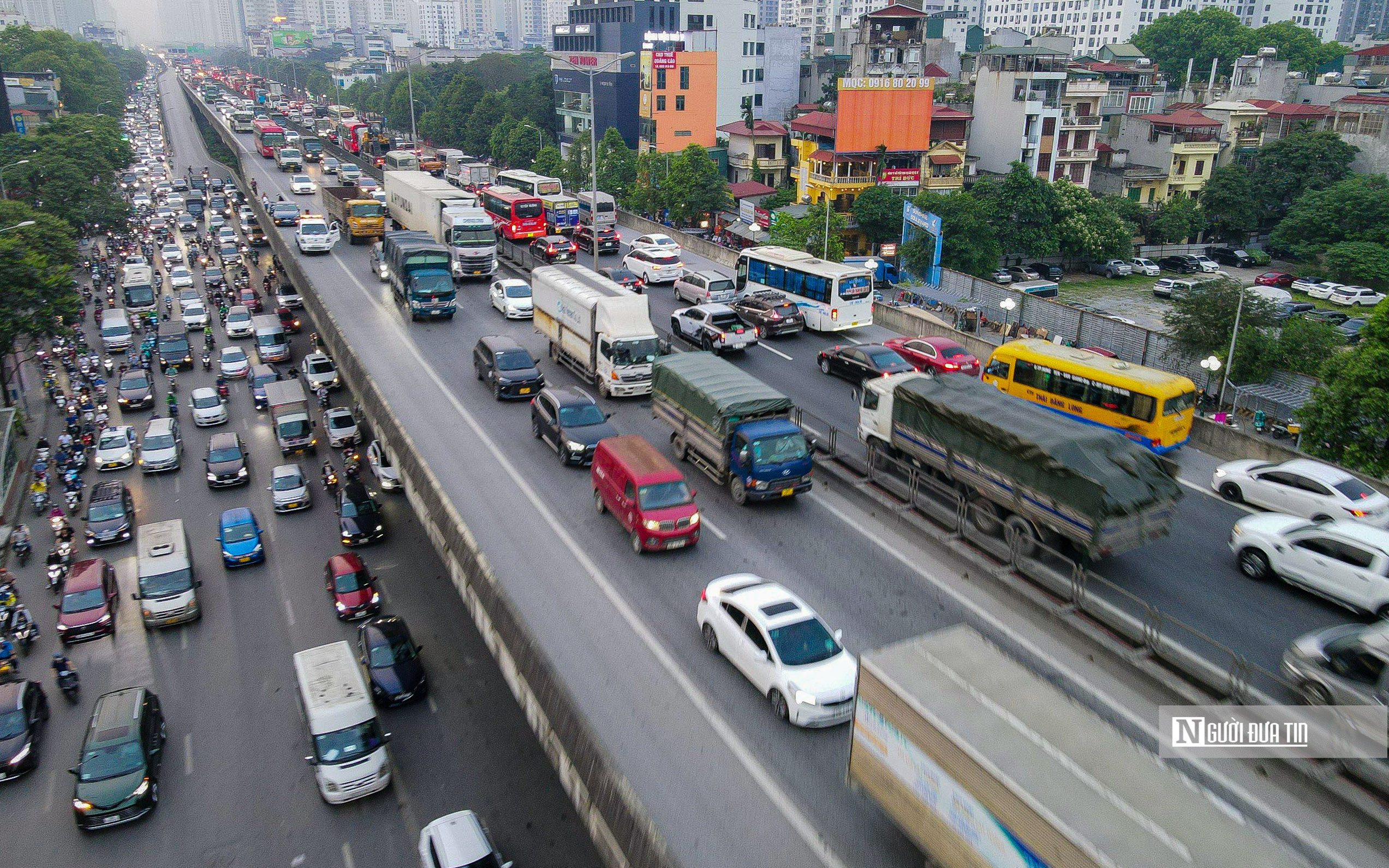 Dân sinh - Hà Nội: Người dân đổ ra bến xe về quê khiến giao thông ùn ứ (Hình 14).