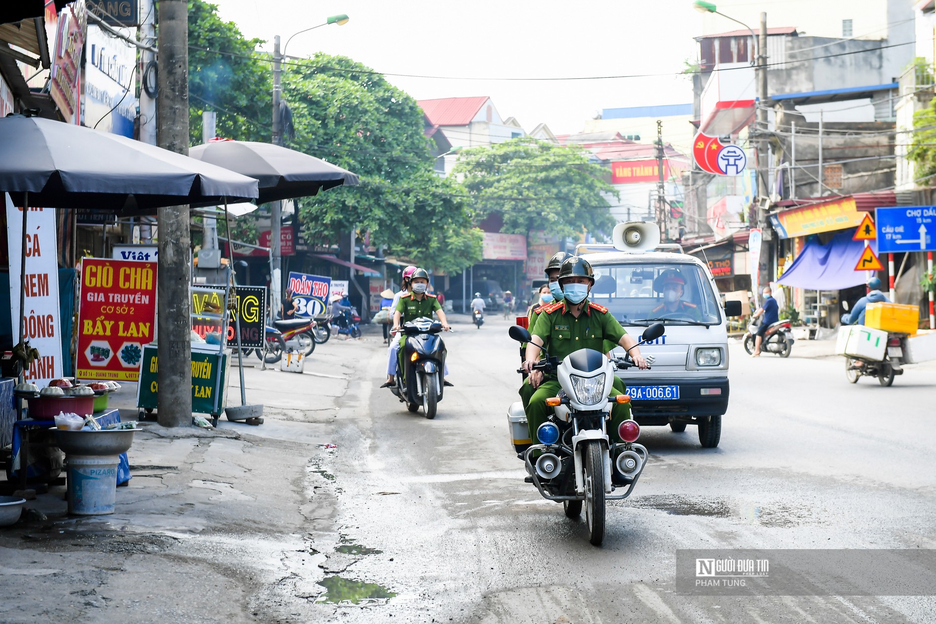 Sự kiện - Ngoại thành Hà Nội tăng cường tuần tra, xử lý vi phạm phòng dịch  (Hình 14).