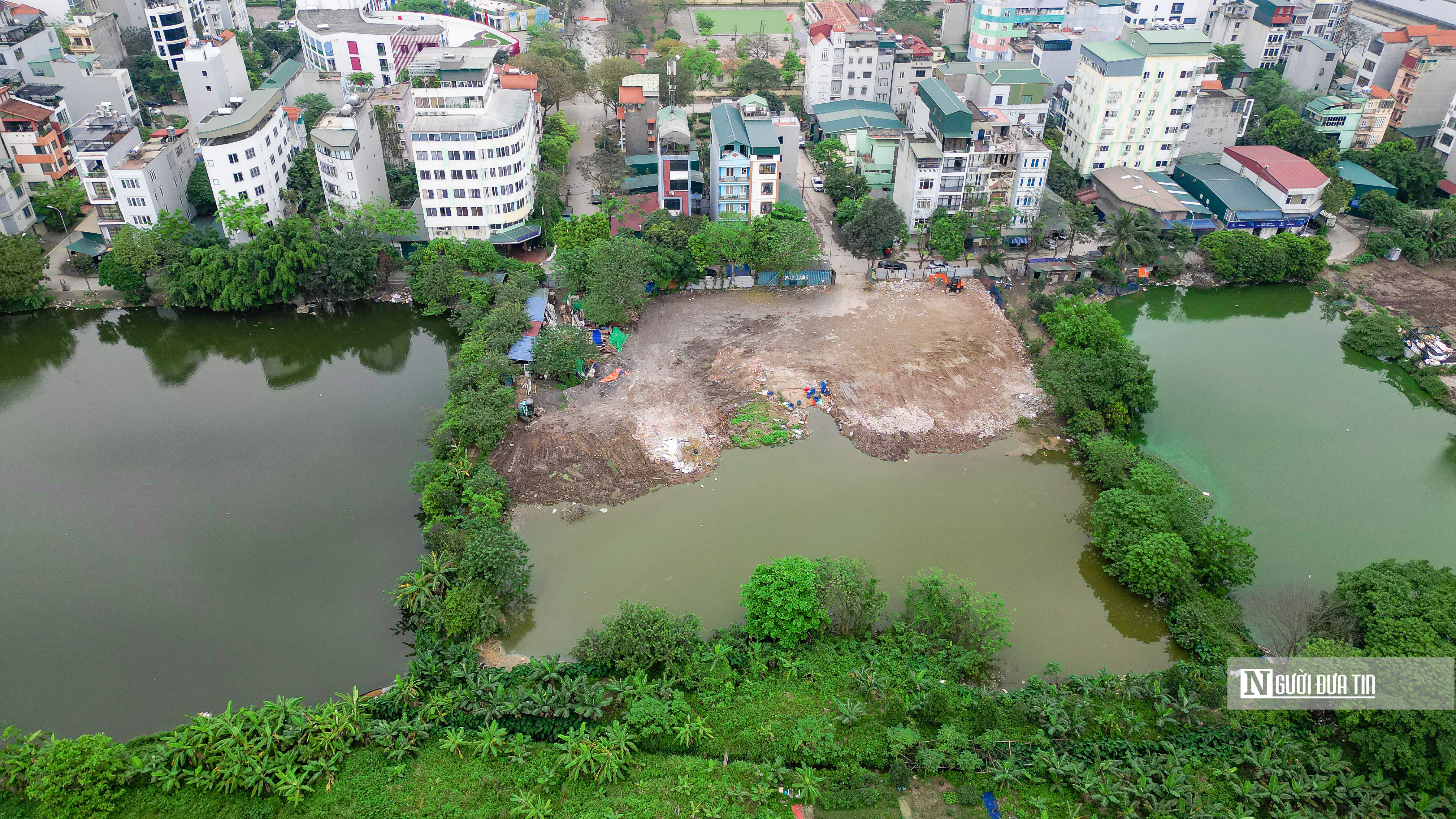 Môi trường - Hà Nội: Đổ phế thải lấp ao hồ tại phường Yên Sở (Hình 4).