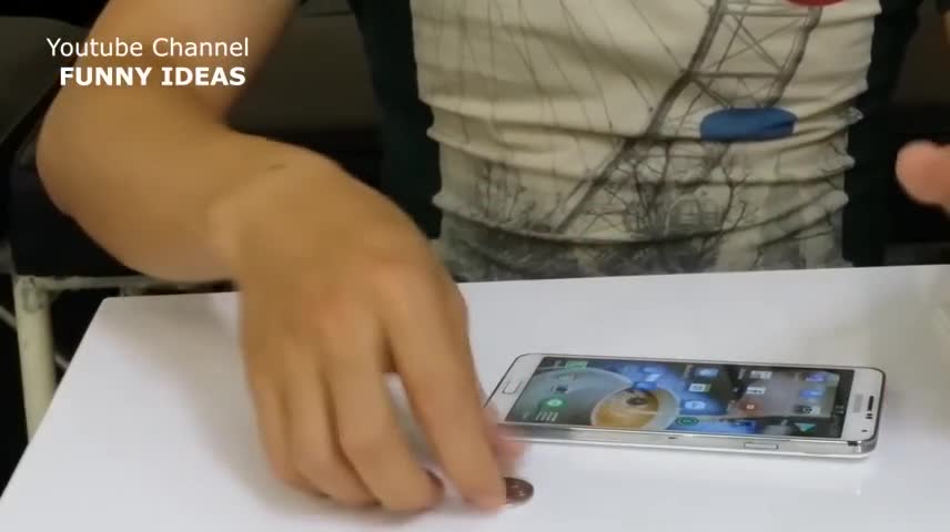 Ảo thuật bằng smartphone- Đưa đồng xu vào trong màn hình