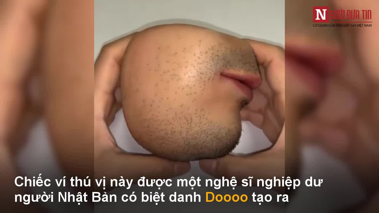 Kinh hãi chiếc ví tiền hình miệng người quá thật
