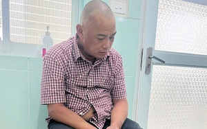 Ngăn chặn nam thanh niên cầm dao đe dọa người cản mình nhảy cầu tự tử - Ảnh 4.