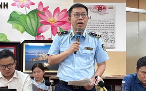 Giá xăng giảm nhẹ - Ảnh 2.