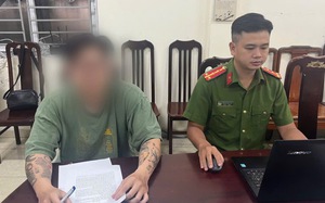 Tạm giữ hình sự gã đàn ông xăm trổ hành hung người phụ nữ ở chung cư- Ảnh 3.