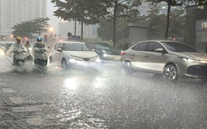 Miền Bắc li&ecirc;n tiếp đ&oacute;n đợt kh&ocirc;ng kh&iacute; lạnh tr&agrave;n về, nhiệt độ giảm nhanh, mưa d&ocirc;ng sầm sập - Ảnh 2.