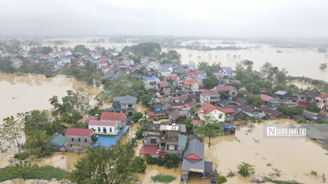 Hà Nội: Vùng “rốn lũ” huyện Chương Mỹ cô lập trong biển nước
- Ảnh 2.