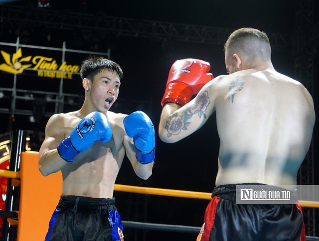 Thi đấu đối kháng kickboxing. Ảnh: Thu Dịu