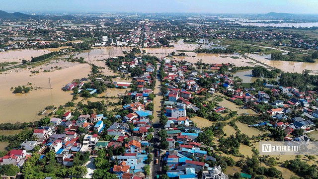 Hà Nội huy động hơn 1.200 cán bộ, chiến sĩ ứng phó sạt lở đê kè và ngập úng - Ảnh 1.